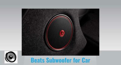 Beats-Subwoofer-for-Car .. A car speaker inside the car door . Beats logo center the speaker .
